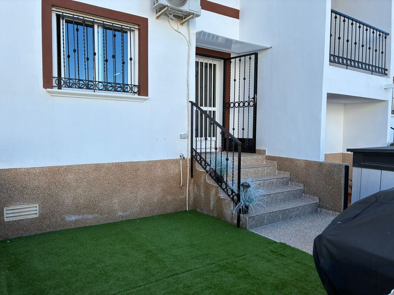 Garden in apartment for sale in Punta Prima