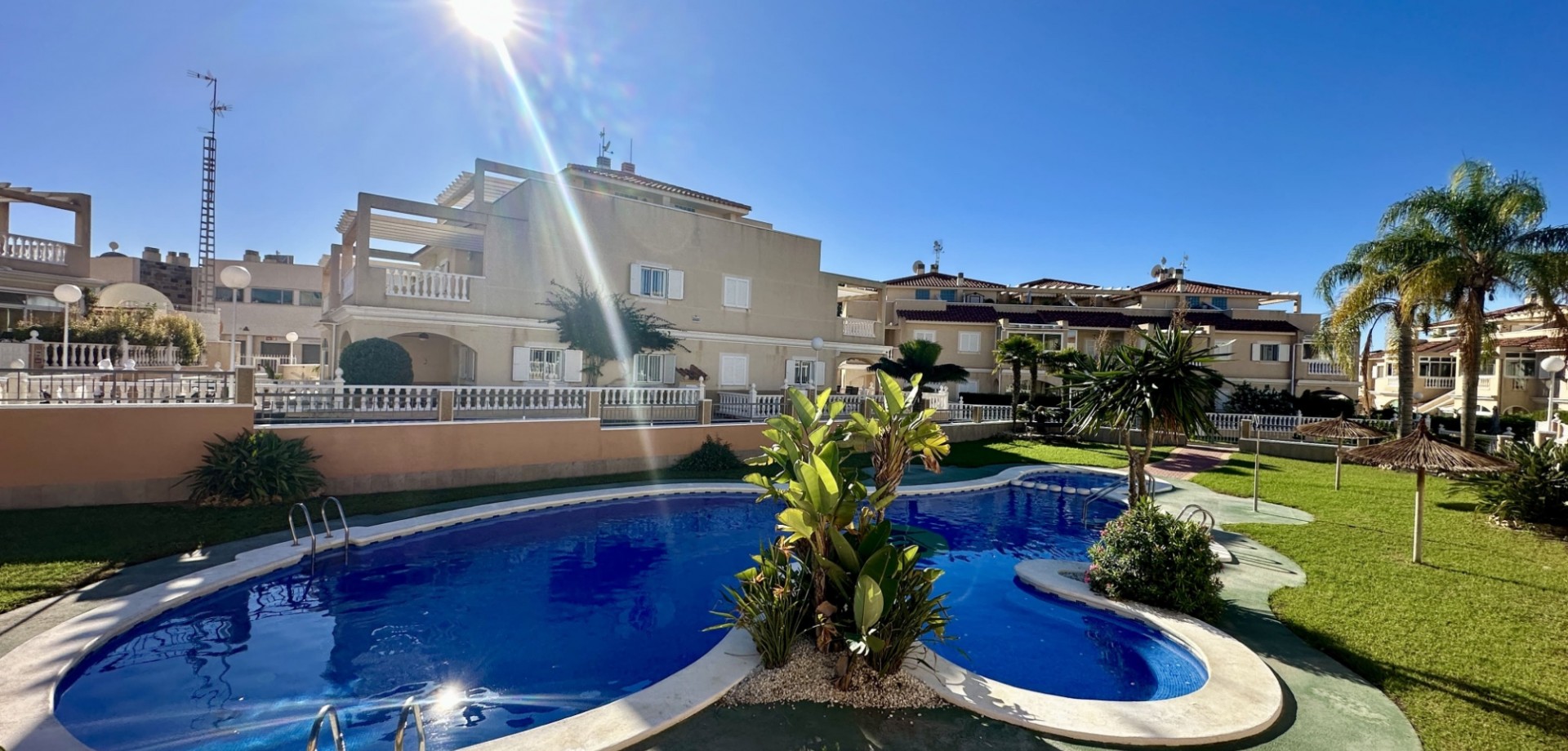 Pool area in duplex for sale in Orihuela Costa
