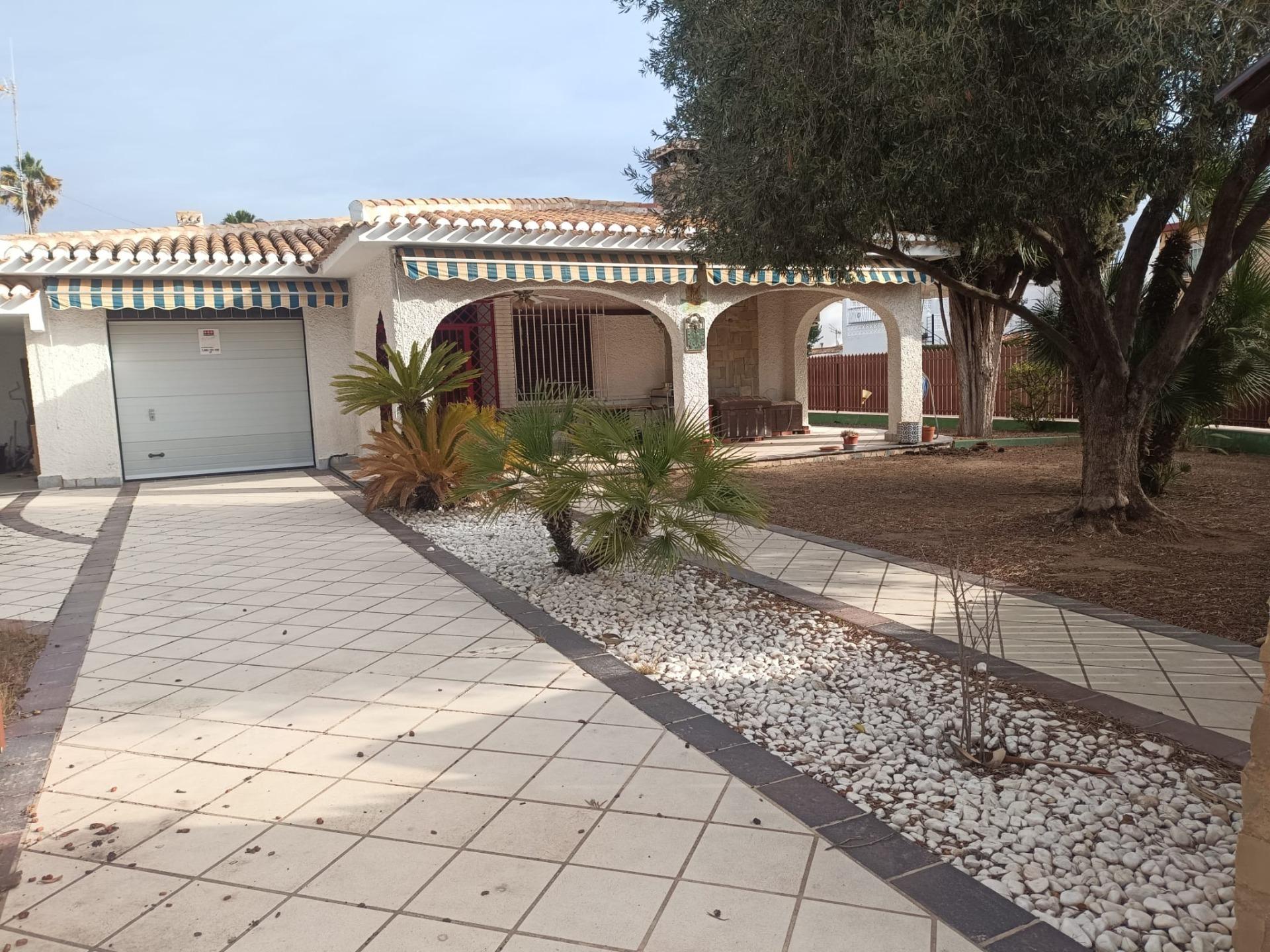 Pool area in villa for sale in Orihuela Costa
