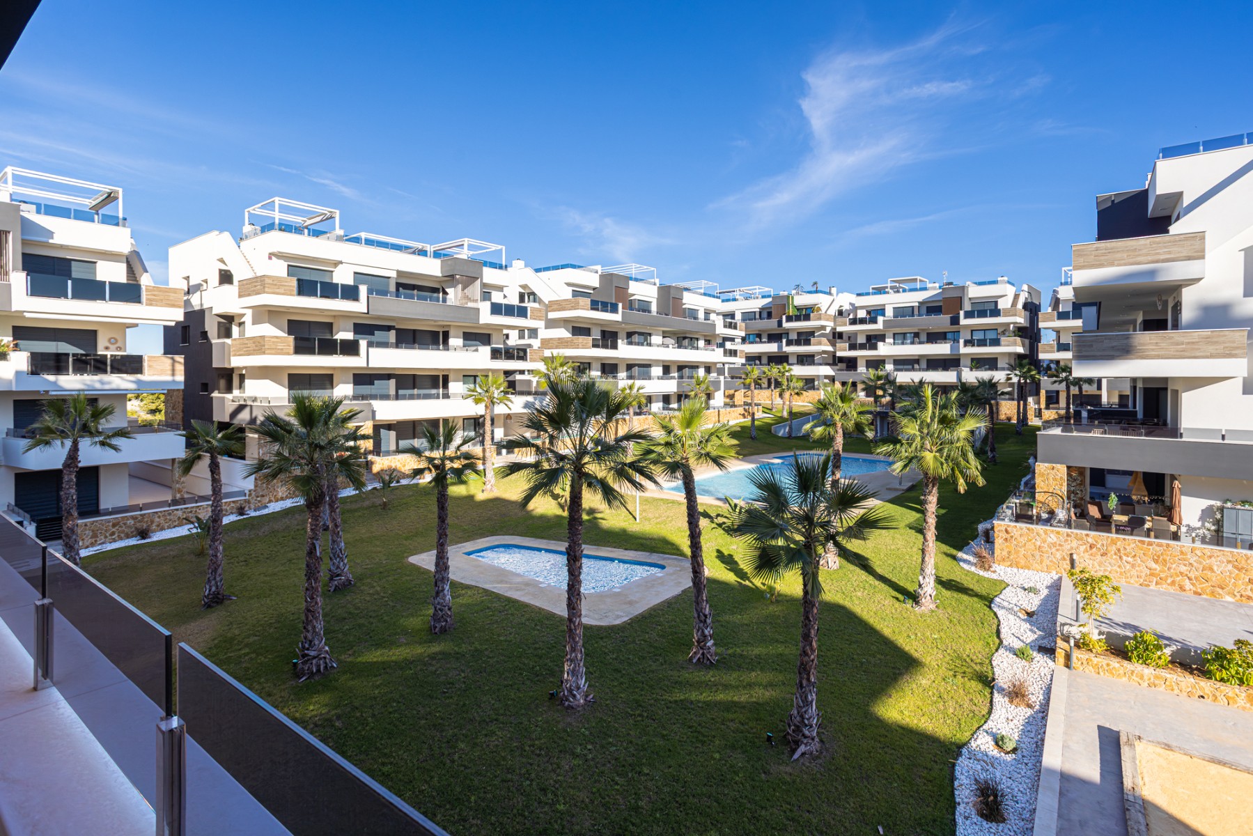 Pool area in apartment for sale in Orihuela Costa