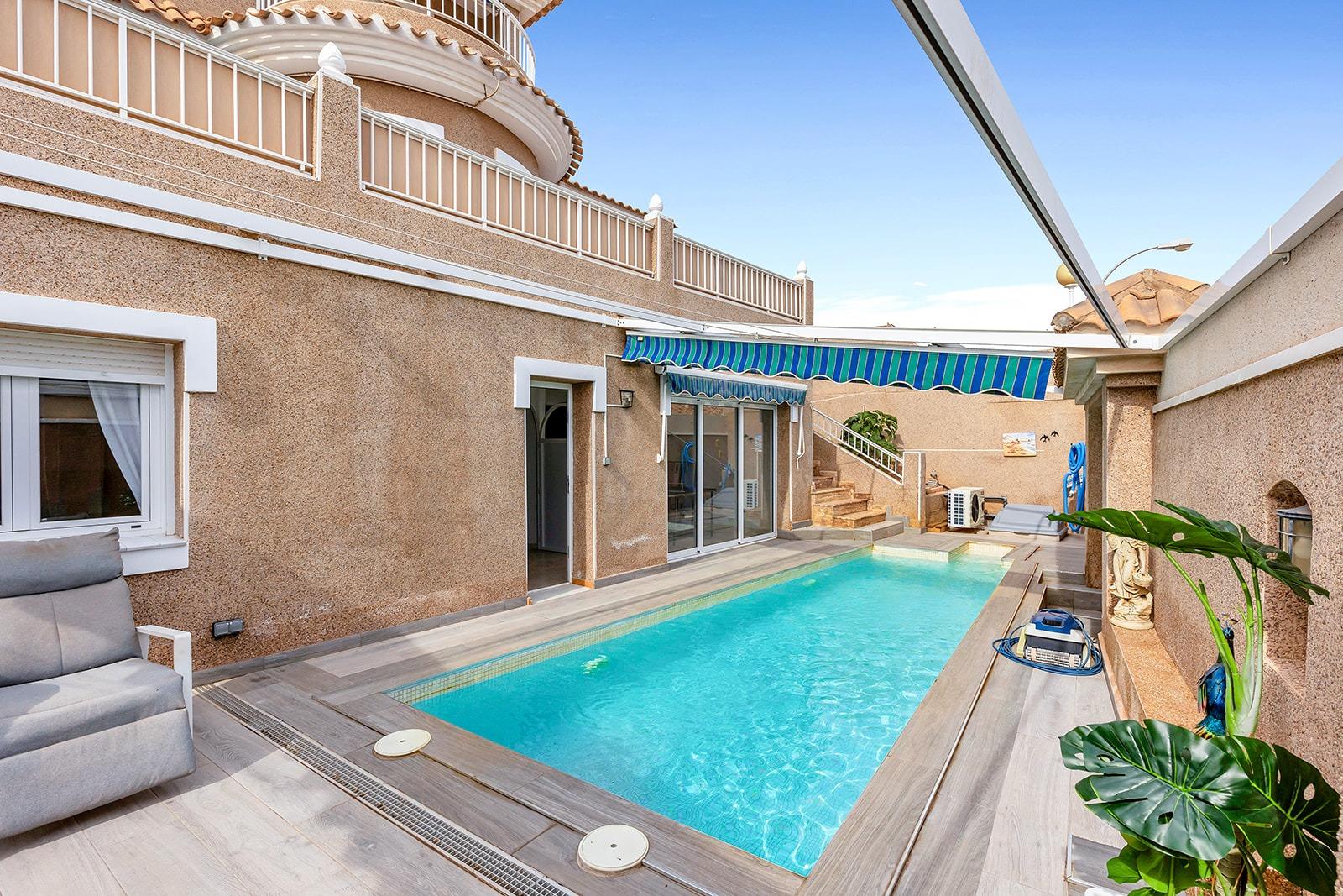 Pool area in villa for sale in Torrevieja