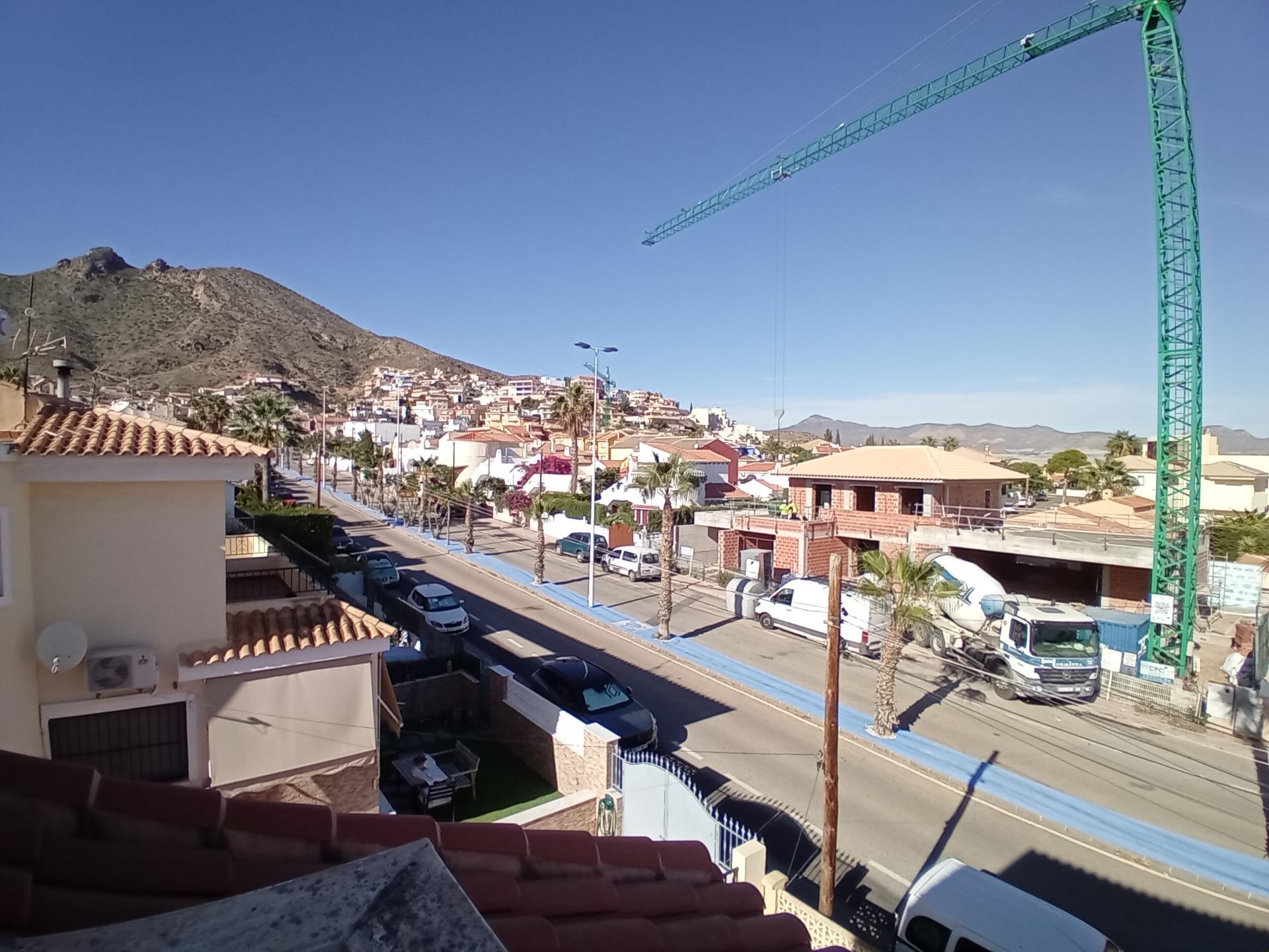 Pool area in terraced for sale in Puerto de Mazarron
