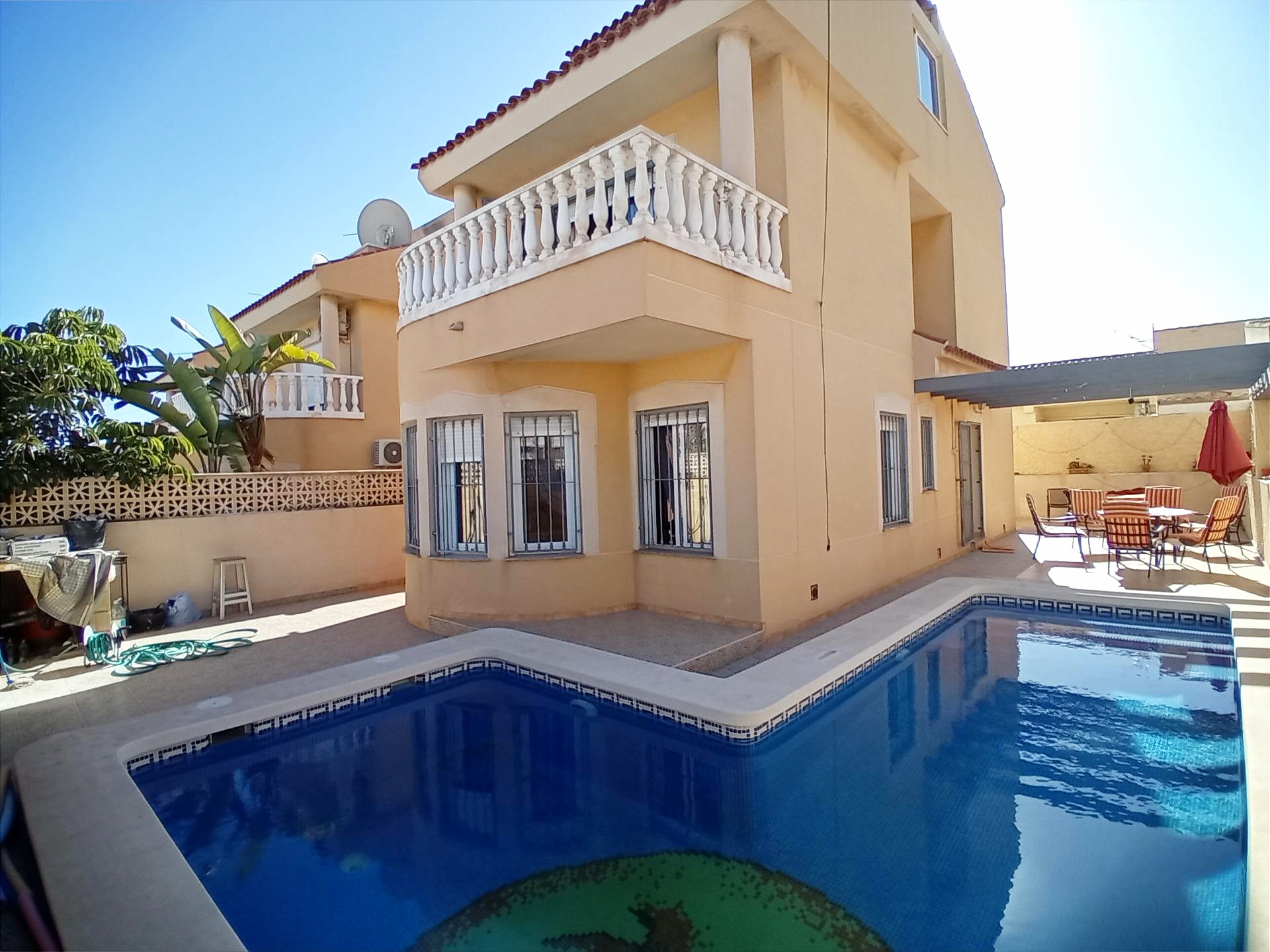 Pool area in terraced for sale in Puerto de Mazarron