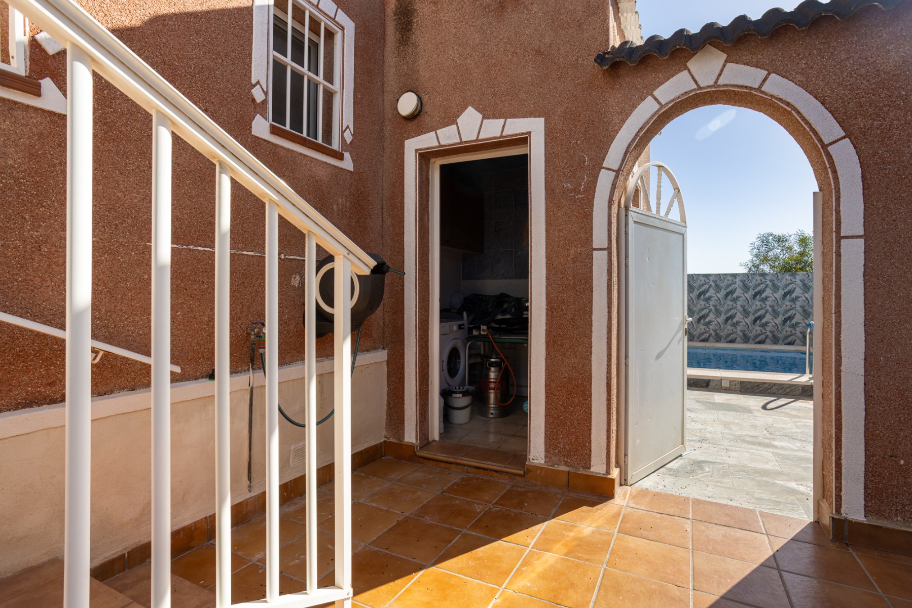 Pool area in villa for sale in Torrevieja
