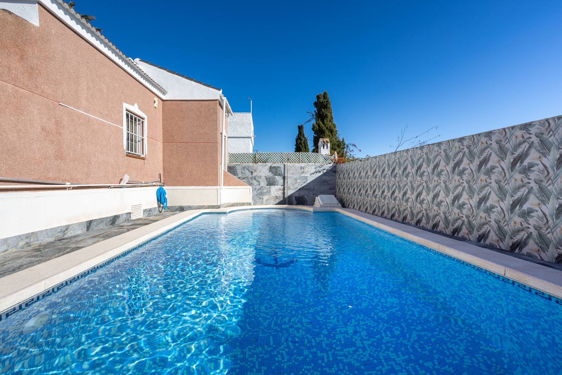 Pool area in villa for sale in Torrevieja