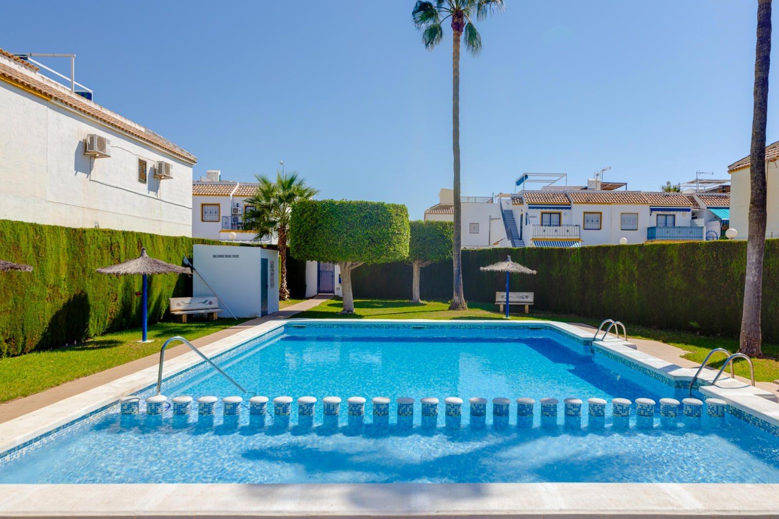 Pool area in bungalow for sale in Torrevieja
