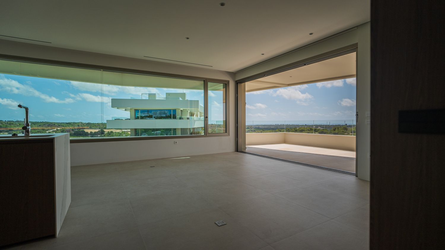 This beautifully designed three-bedroom, two-bathroom apartment is located in the prestigious Madroñ