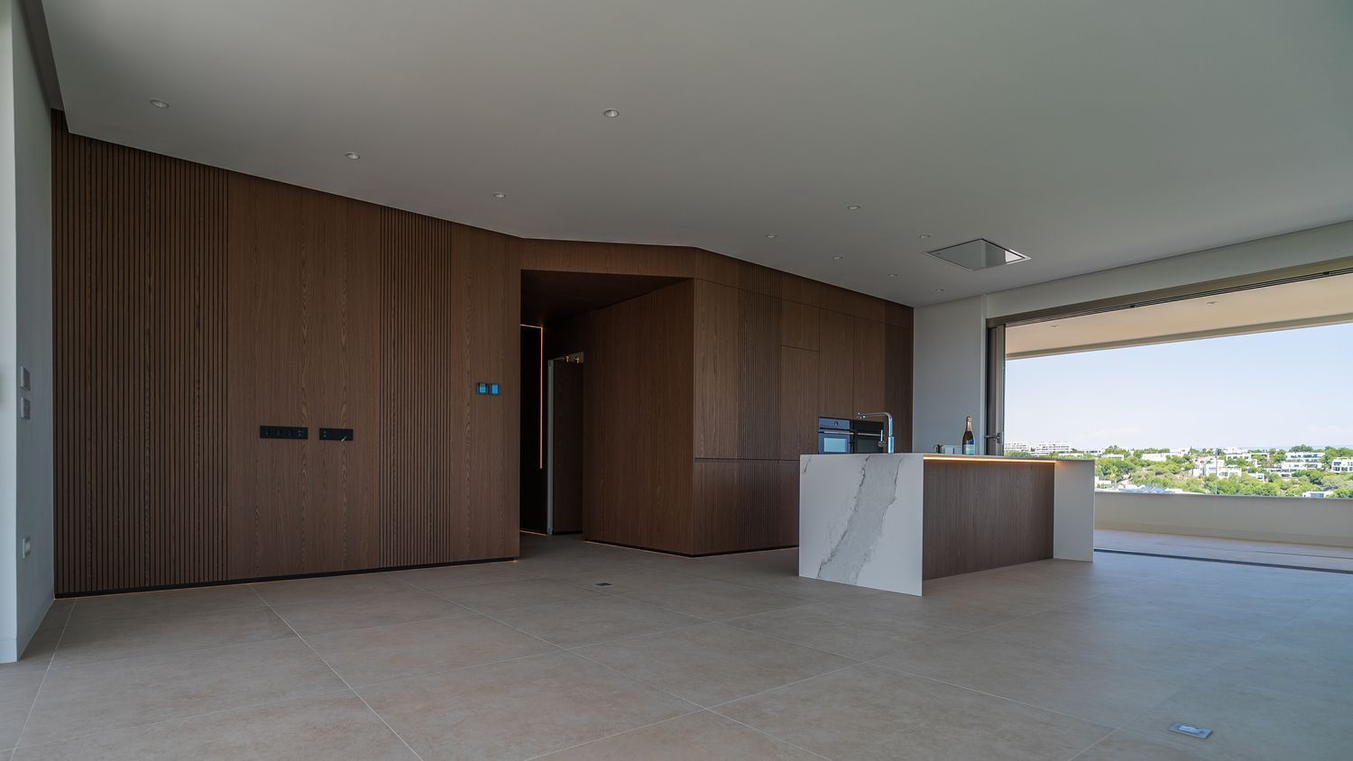 This beautifully designed three-bedroom, two-bathroom apartment is located in the prestigious Madroñ