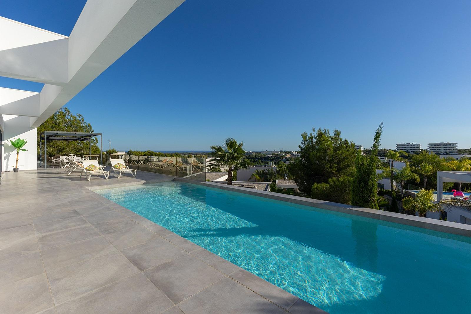 Pool area in villa for sale in Orihuela