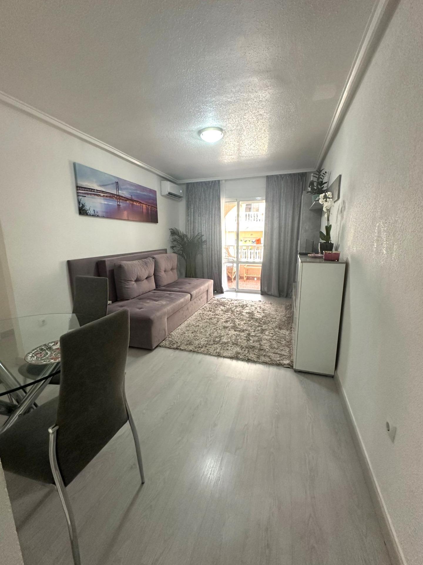 Modern 2 bedroom flat with private terrace, pool and garden in Torrevieja Upon entering this modern