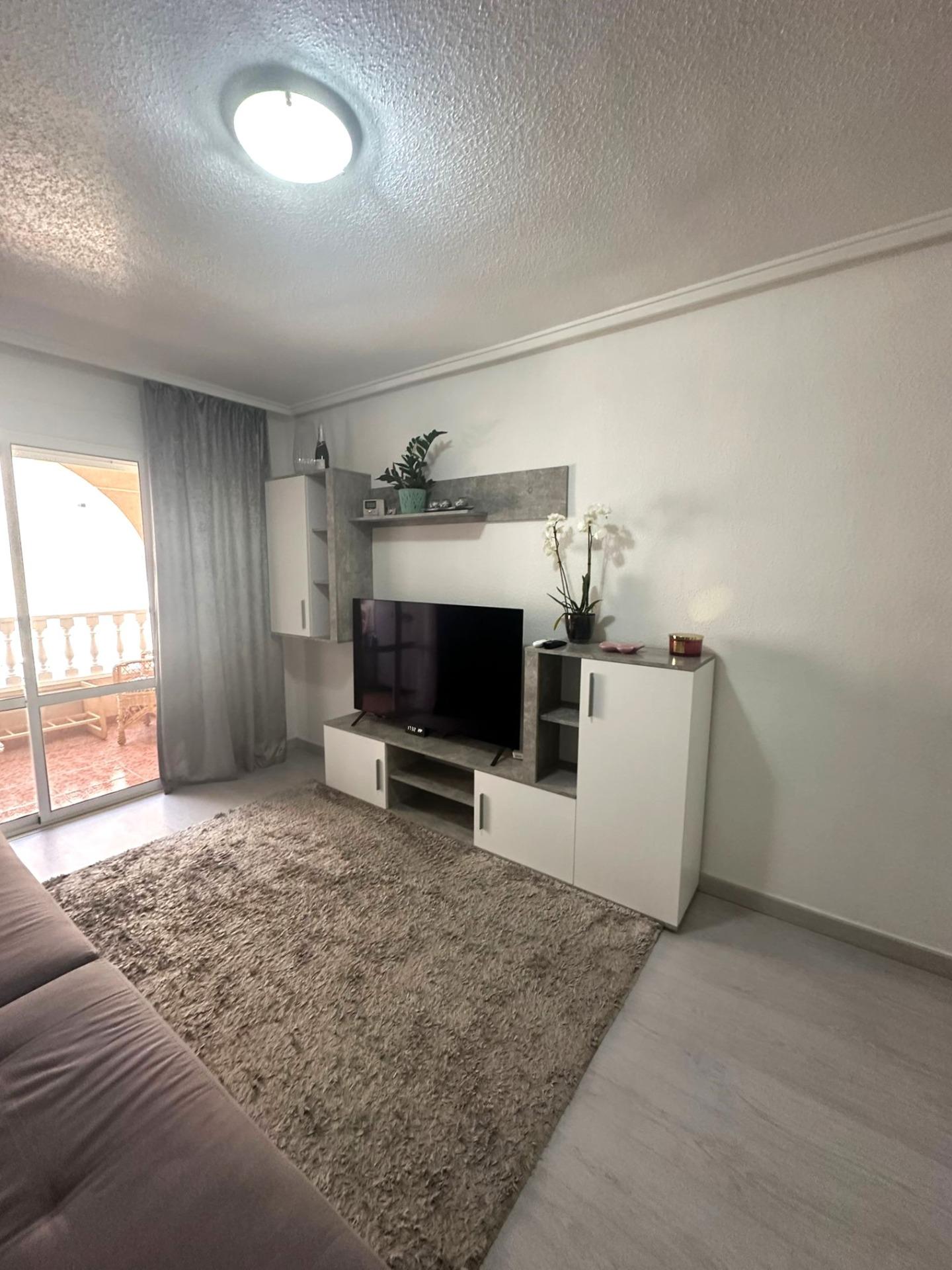 Modern 2 bedroom flat with private terrace, pool and garden in Torrevieja Upon entering this modern