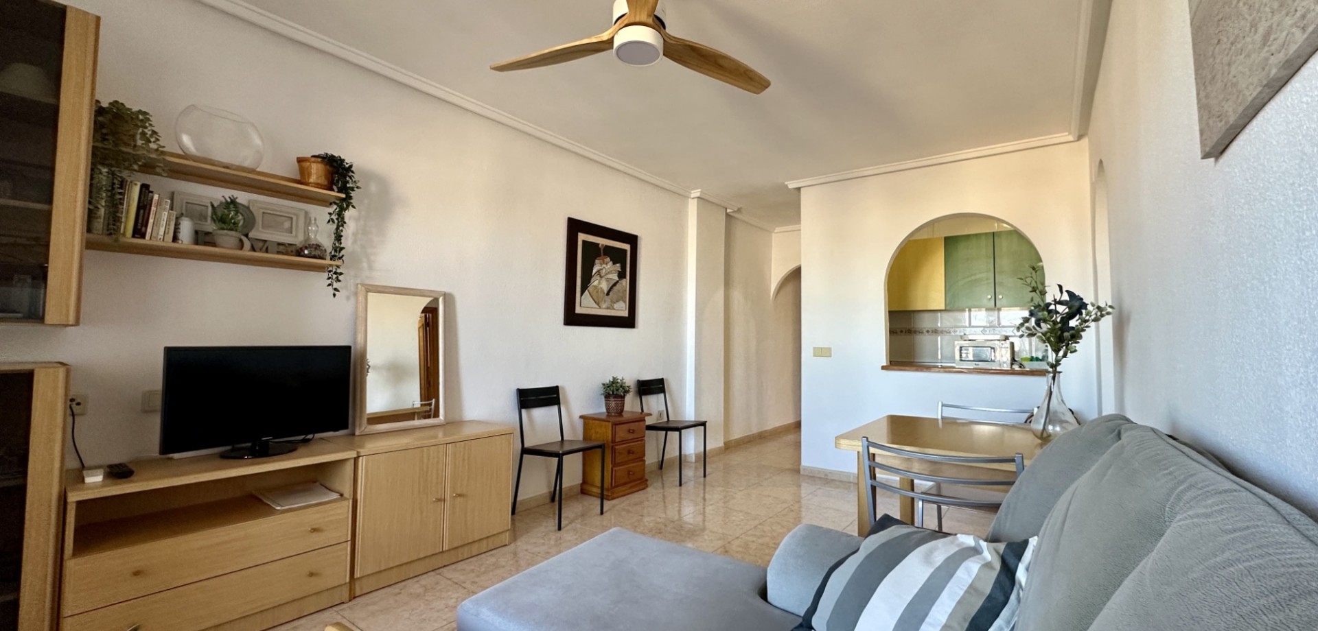 This bright and well-maintained apartment is located on the third floor of a modern building in the