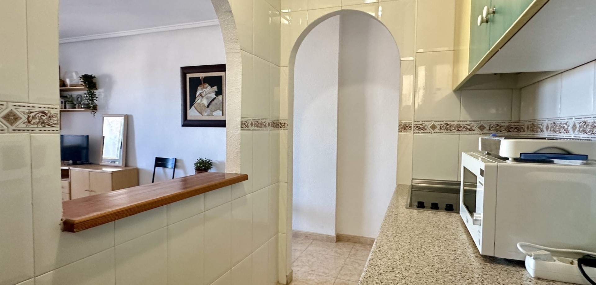 This bright and well-maintained apartment is located on the third floor of a modern building in the
