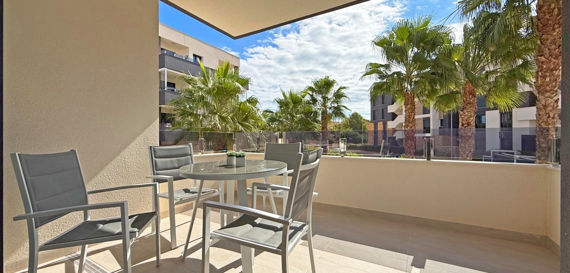 Located in a secure gated community in the heart of Los Altos, this stylish first-floor apartment co