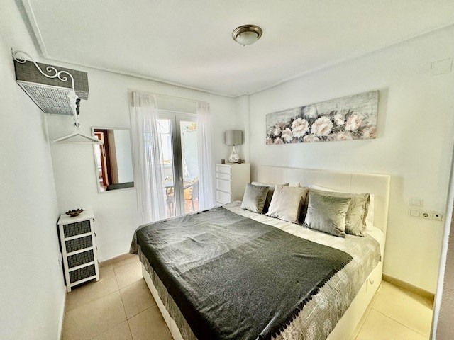 Master bedroom in apartment for sale in Hacienda Riquelme Golf Resort