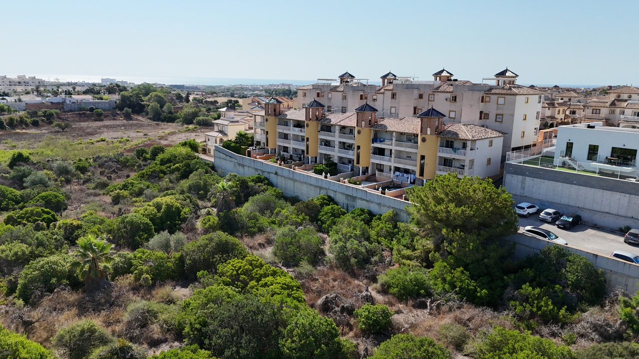 Pool area in apartment for sale in Cabo Roig