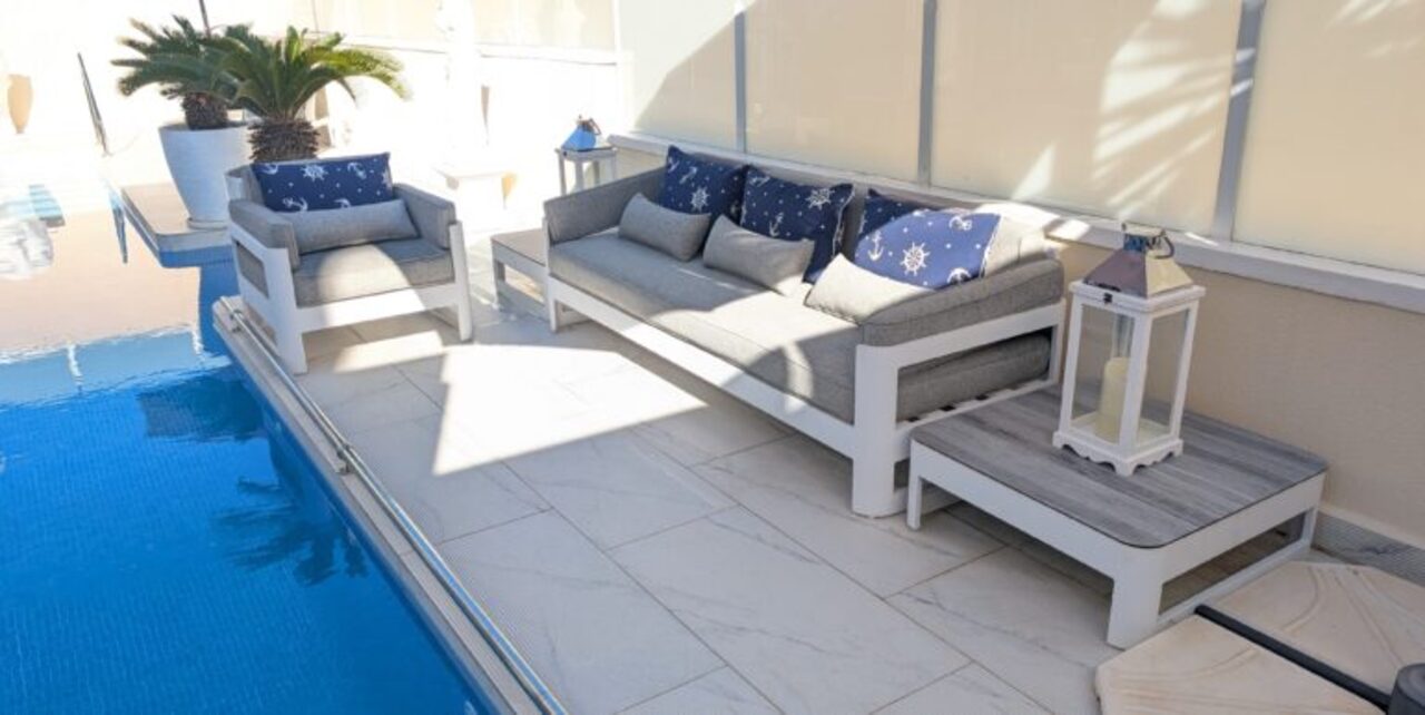 Pool area in villa for sale in Villamartin