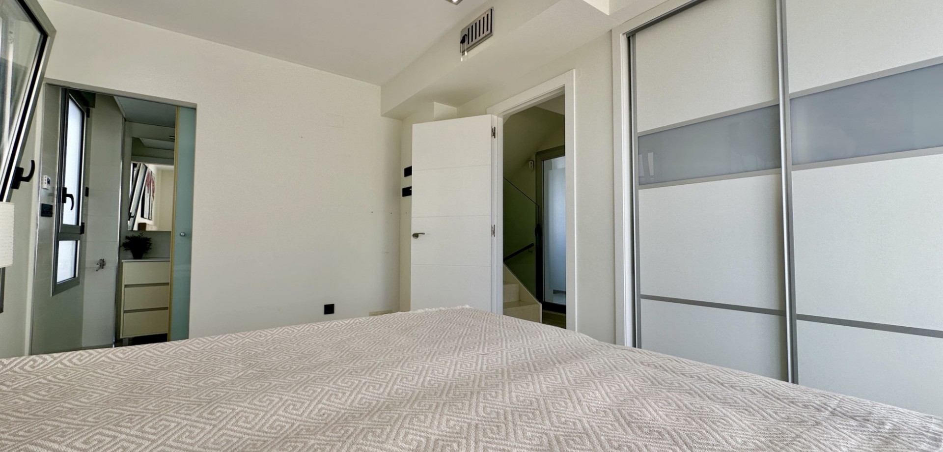Master bedroom in villa for sale in Orihuela Costa