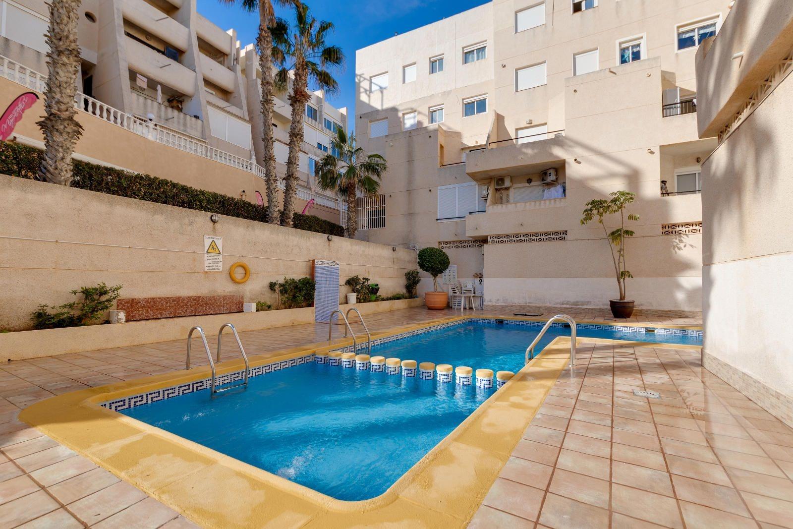Pool area in apartment for sale in Torrevieja