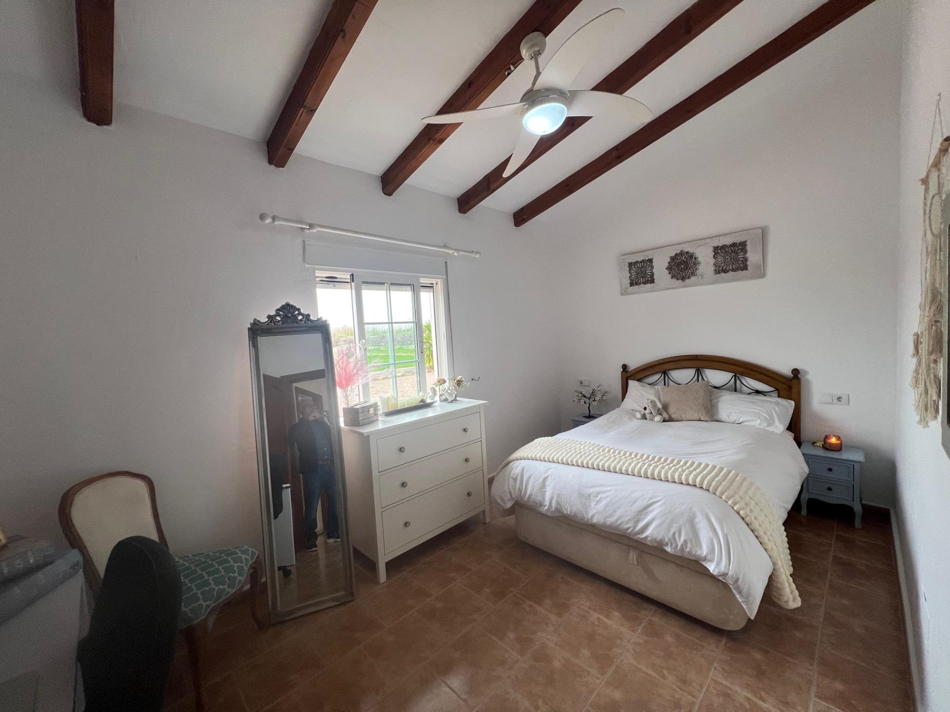 Master bedroom in finca for sale in Dolores