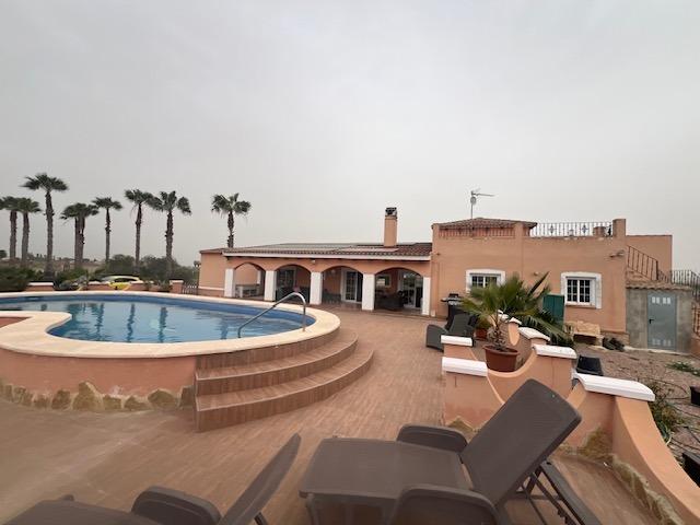 Pool area in finca for sale in Dolores