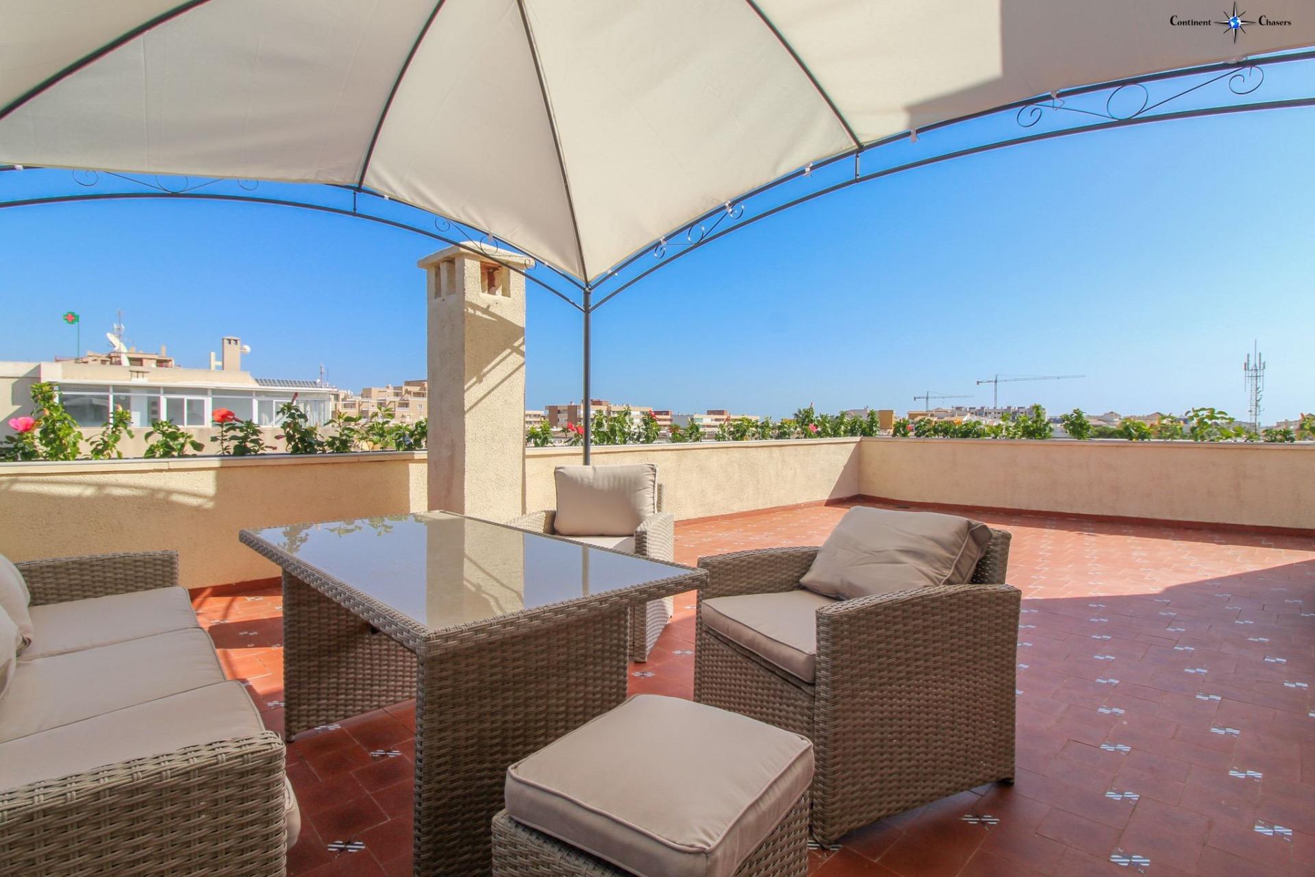 Discover this stunning penthouse located in the exclusive Punta Prima area of Torrevieja