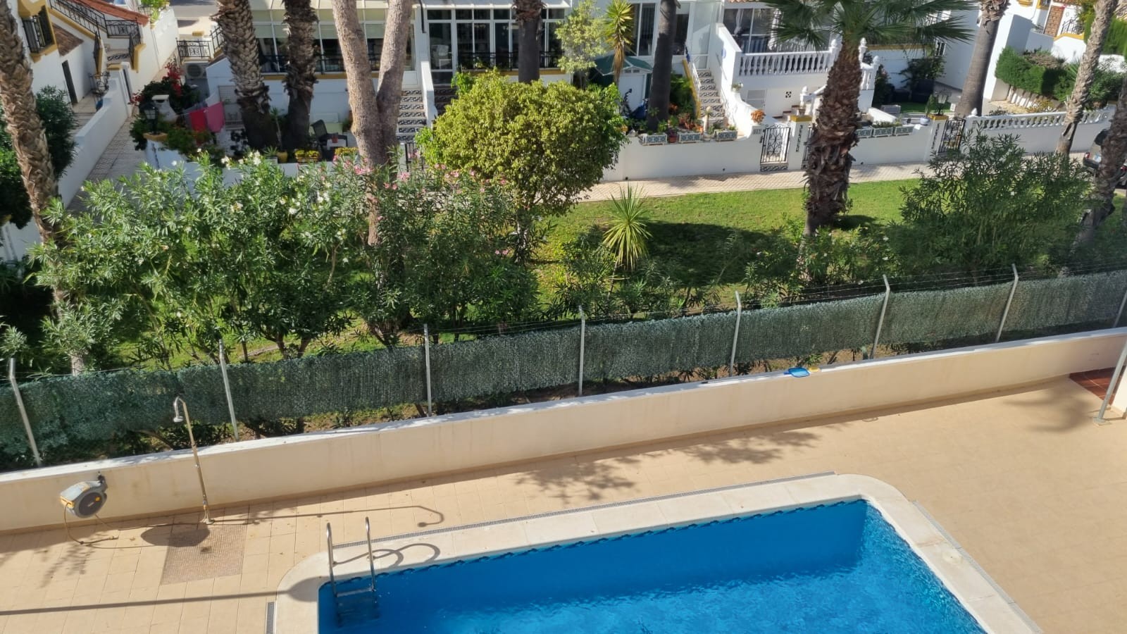 Pool area in villa for sale in Orihuela Costa