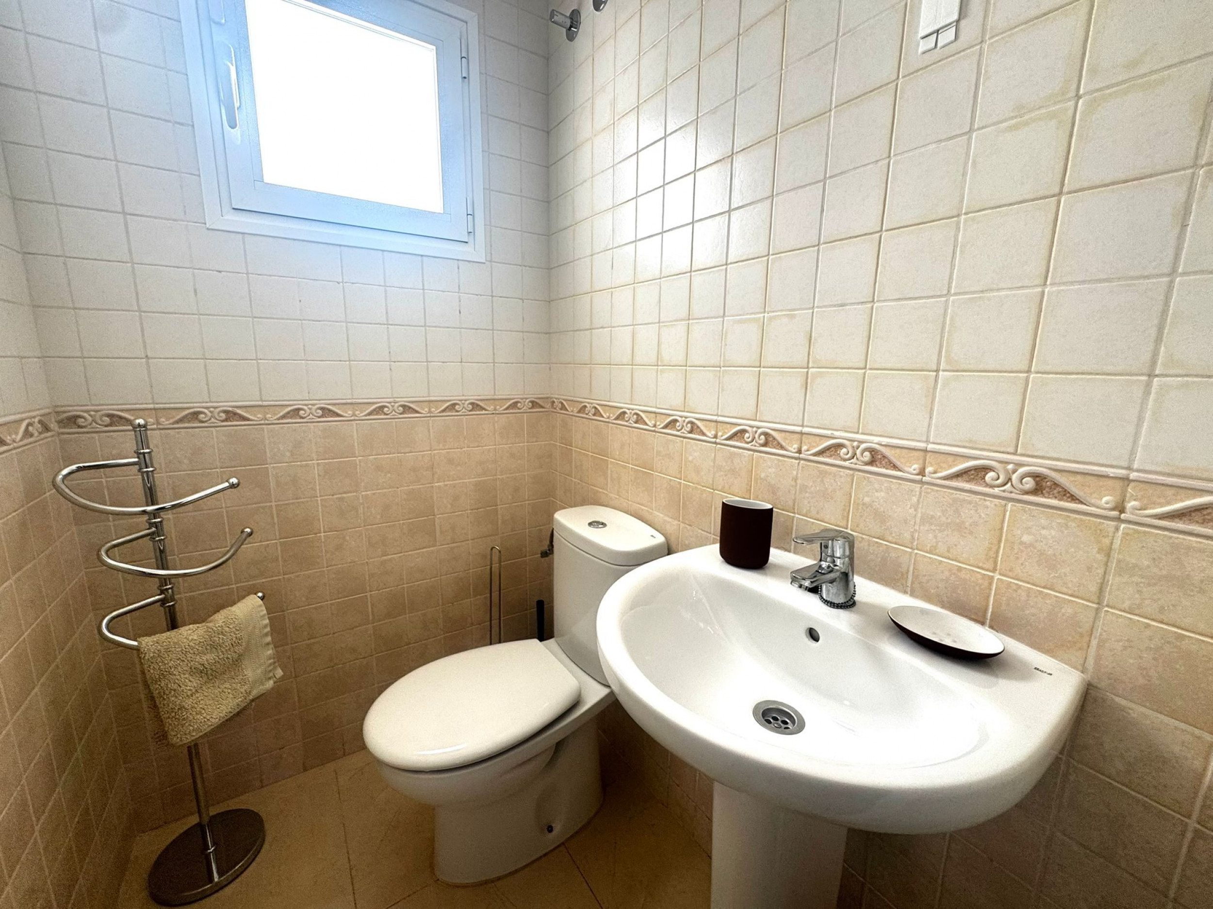 Discover your perfect Spanish retreat with this beautiful end townhouse, ideally situated on a priva