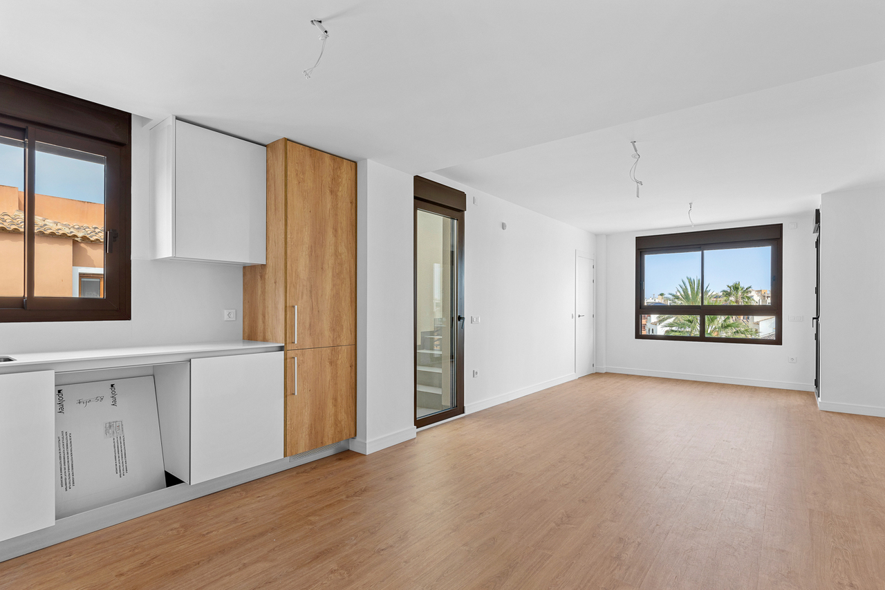 Living room in penthouse for sale in Villamartin