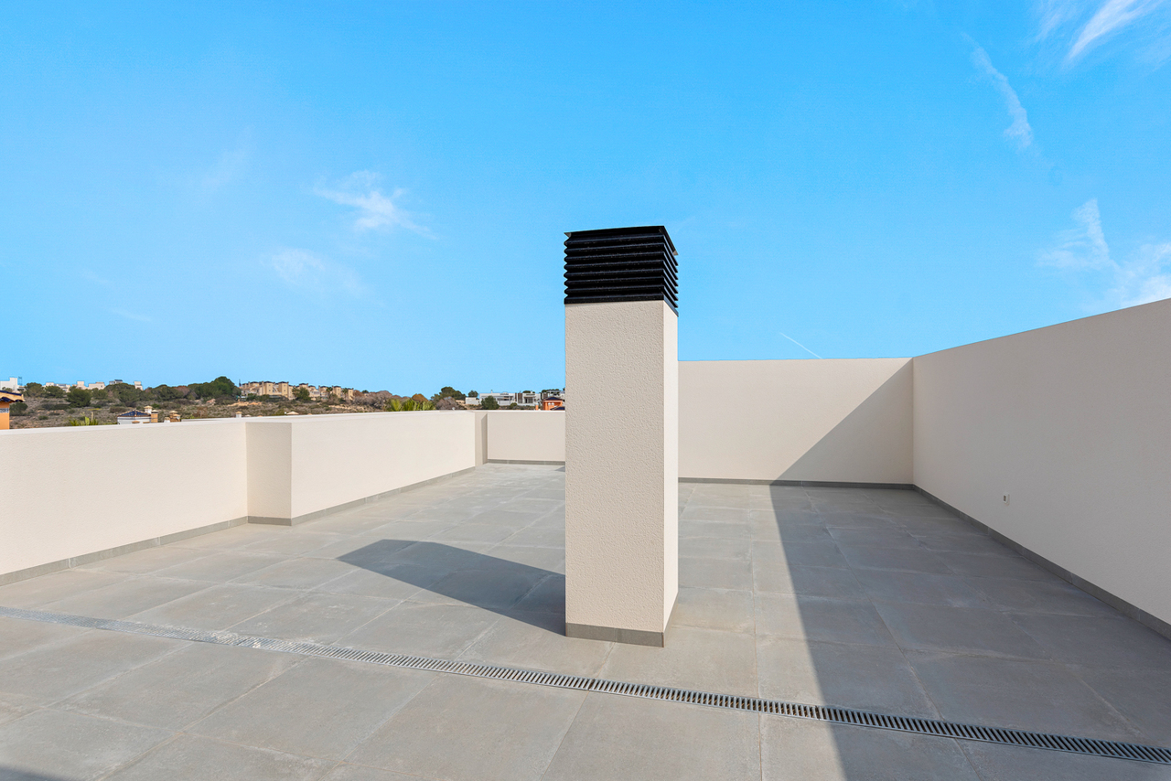 Living room in penthouse for sale in Villamartin