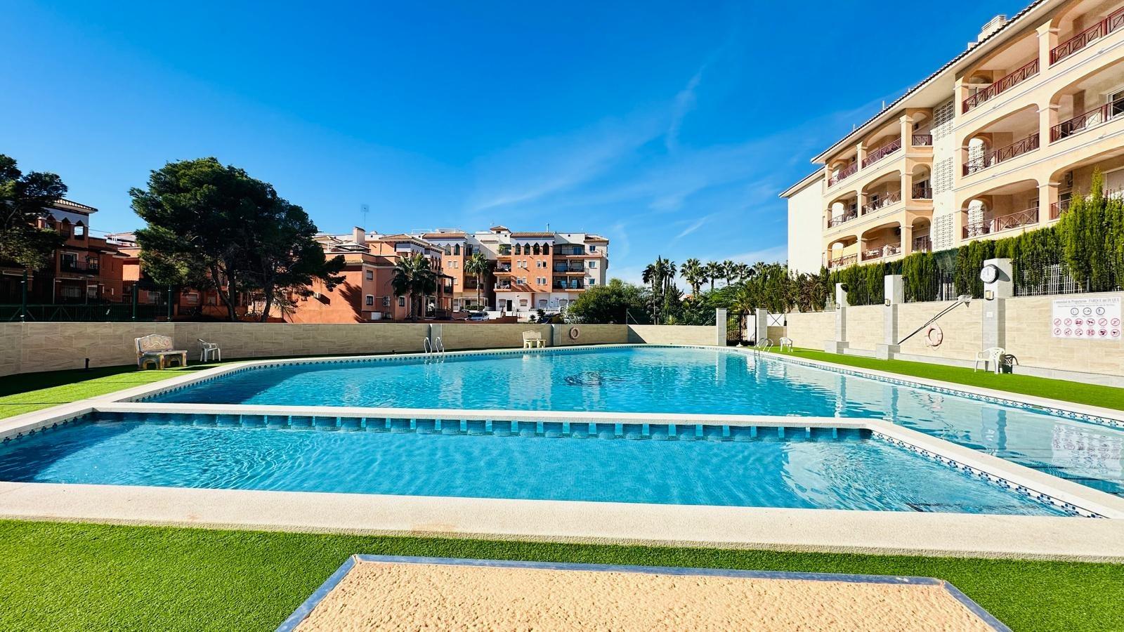 Pool area in apartment for sale in Orihuela Costa