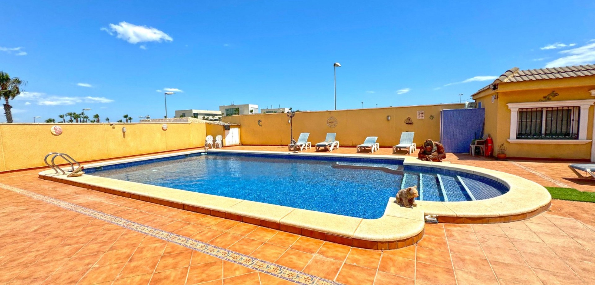 Pool area in villa for sale in Torrevieja