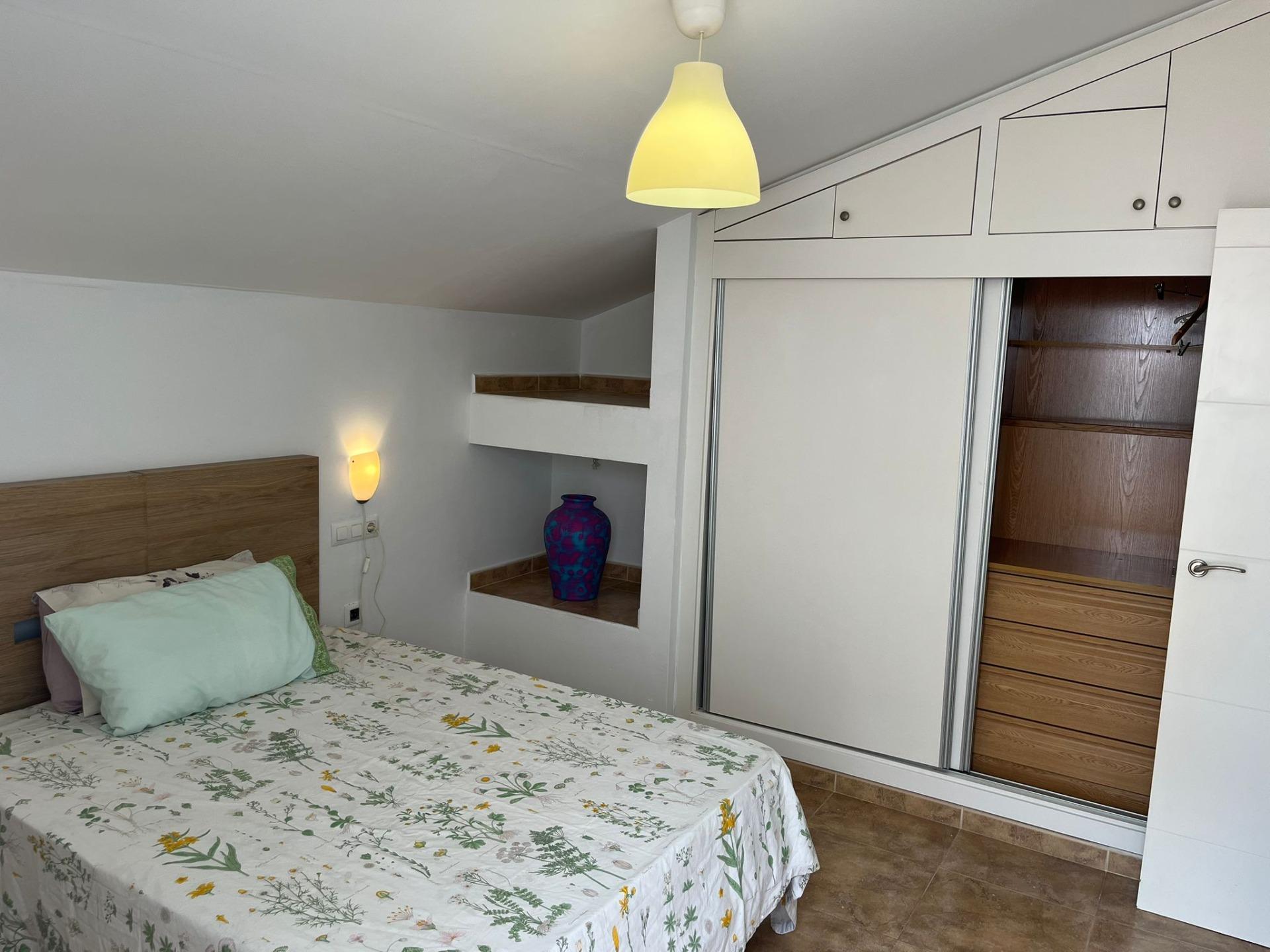 Master bedroom in duplex for sale in Santiago de la Ribera