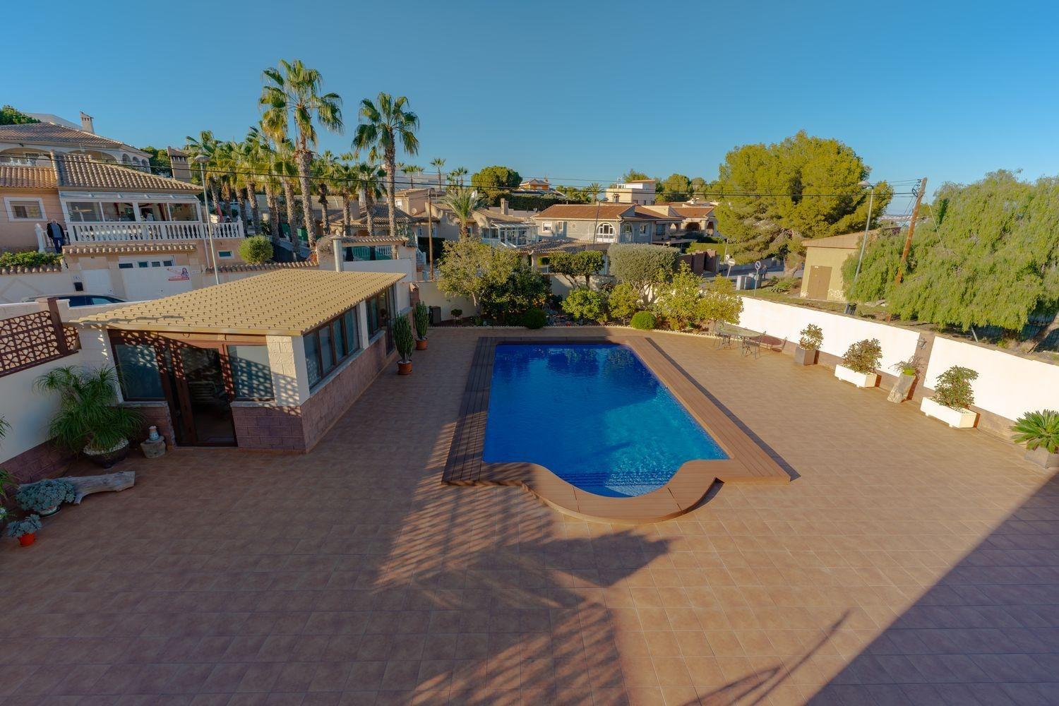 Pool area in villa for sale in Torrevieja