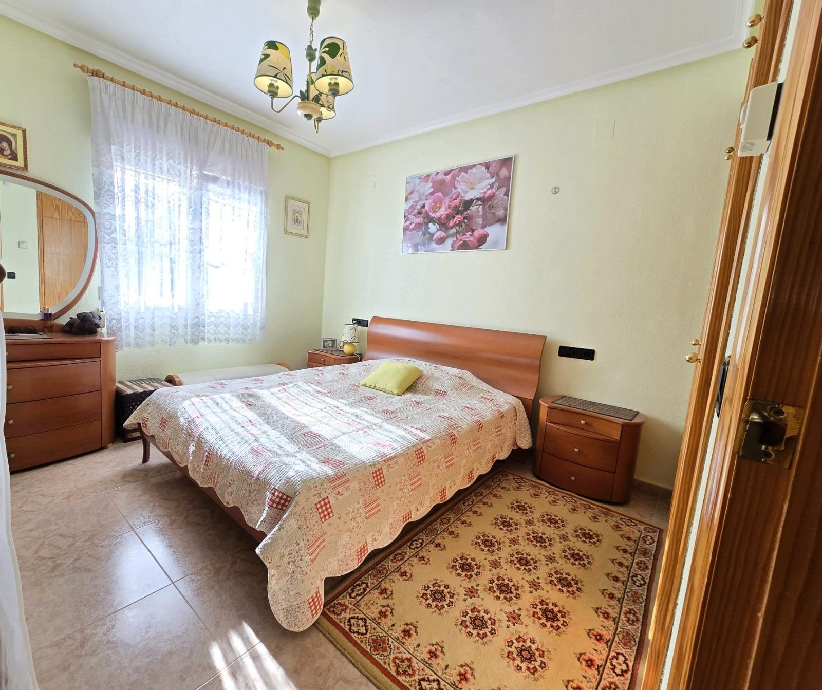 Master bedroom in villa for sale in Orihuela Costa