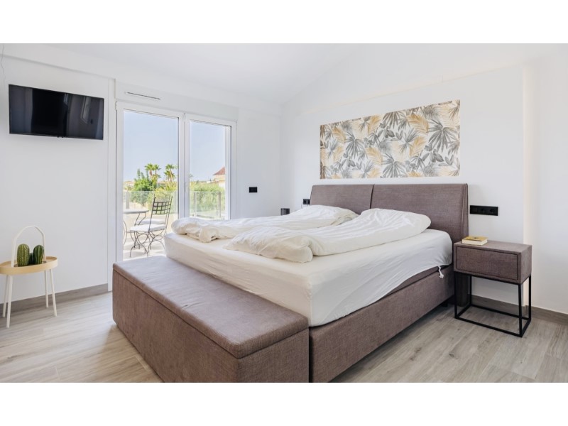 Master bedroom in villa for sale in Alfas del Pi