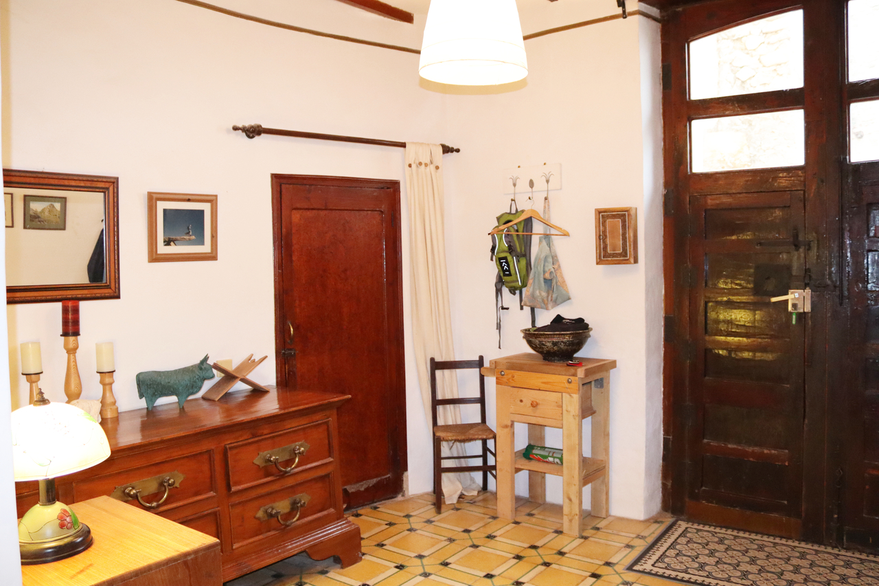 This beautiful traditional Spanish townhouse is located in the heart of the village of Castell de Ca