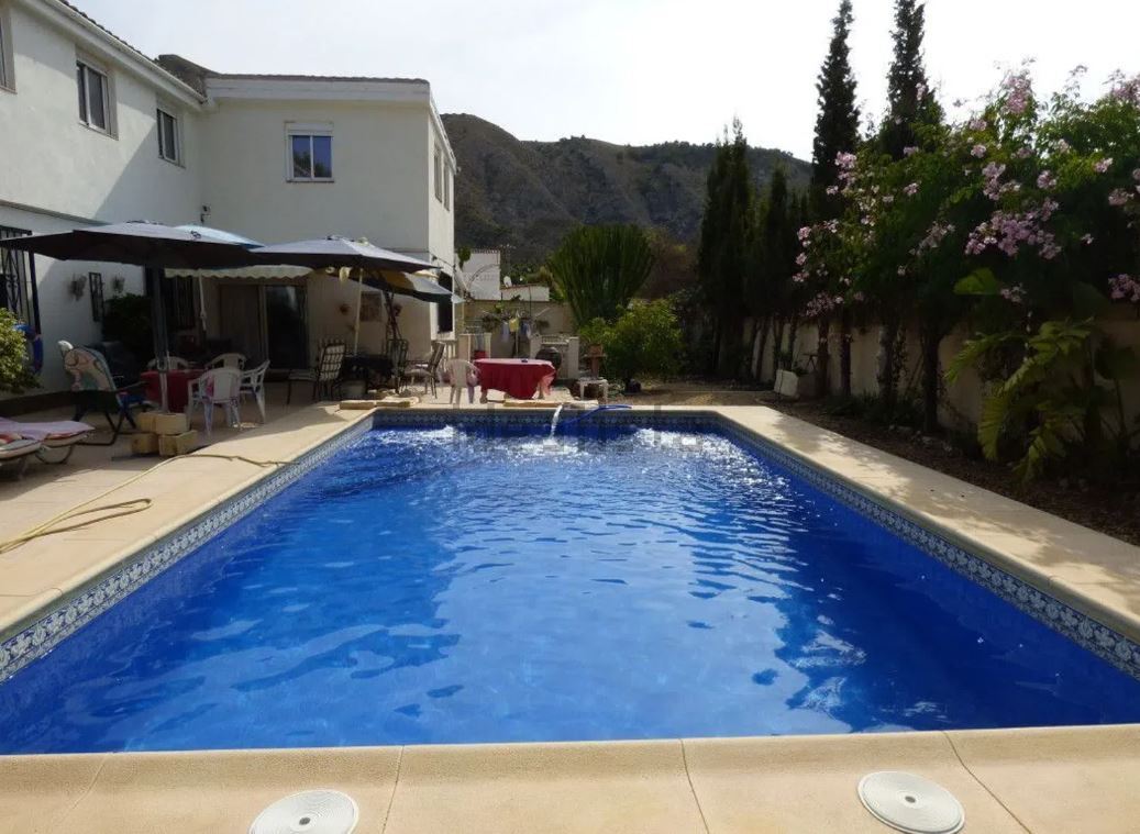 "This large charming villa is composed of four homes in one, three of them with their own access, lo