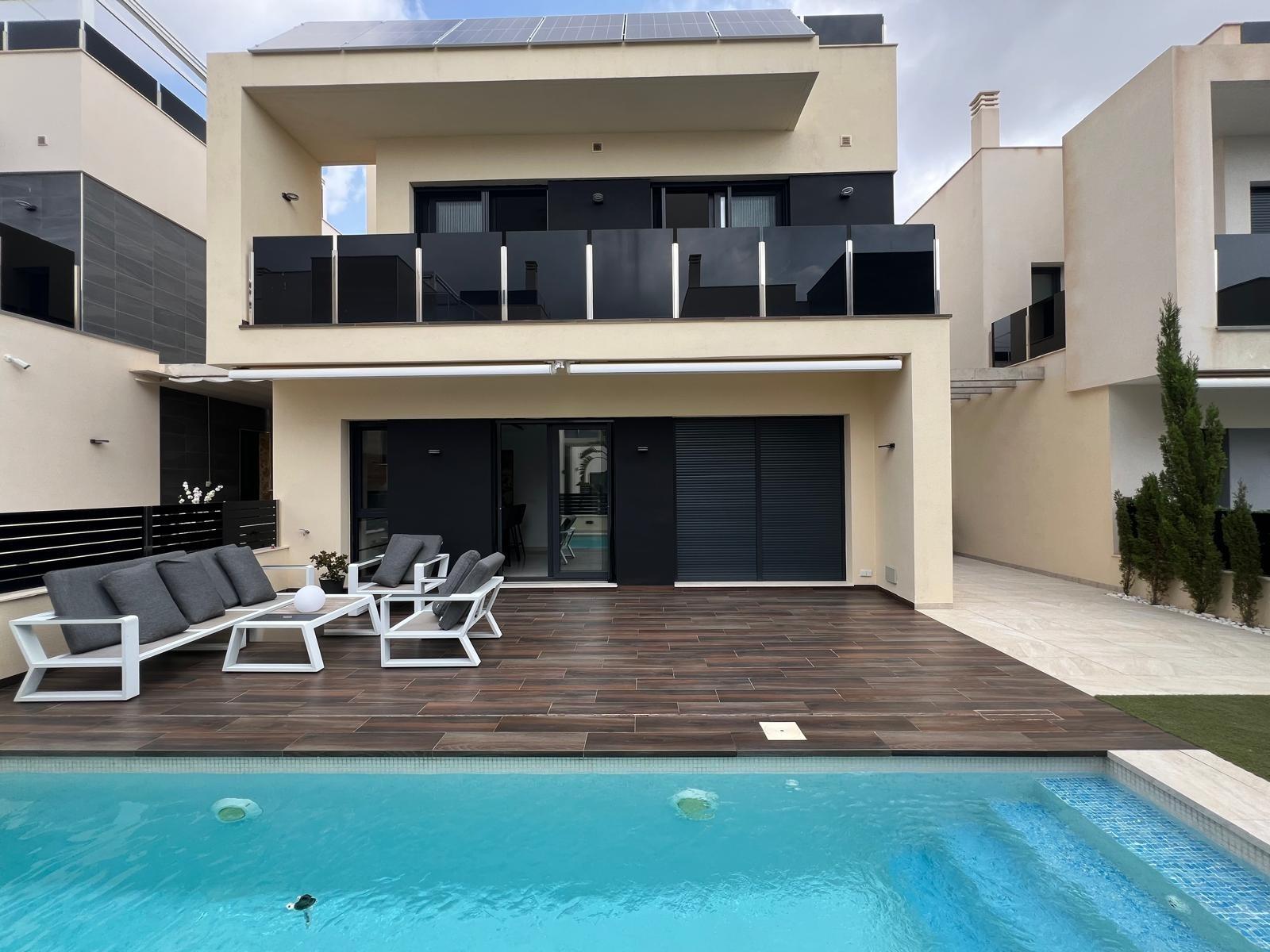 Pool area in villa for sale in Orihuela Costa
