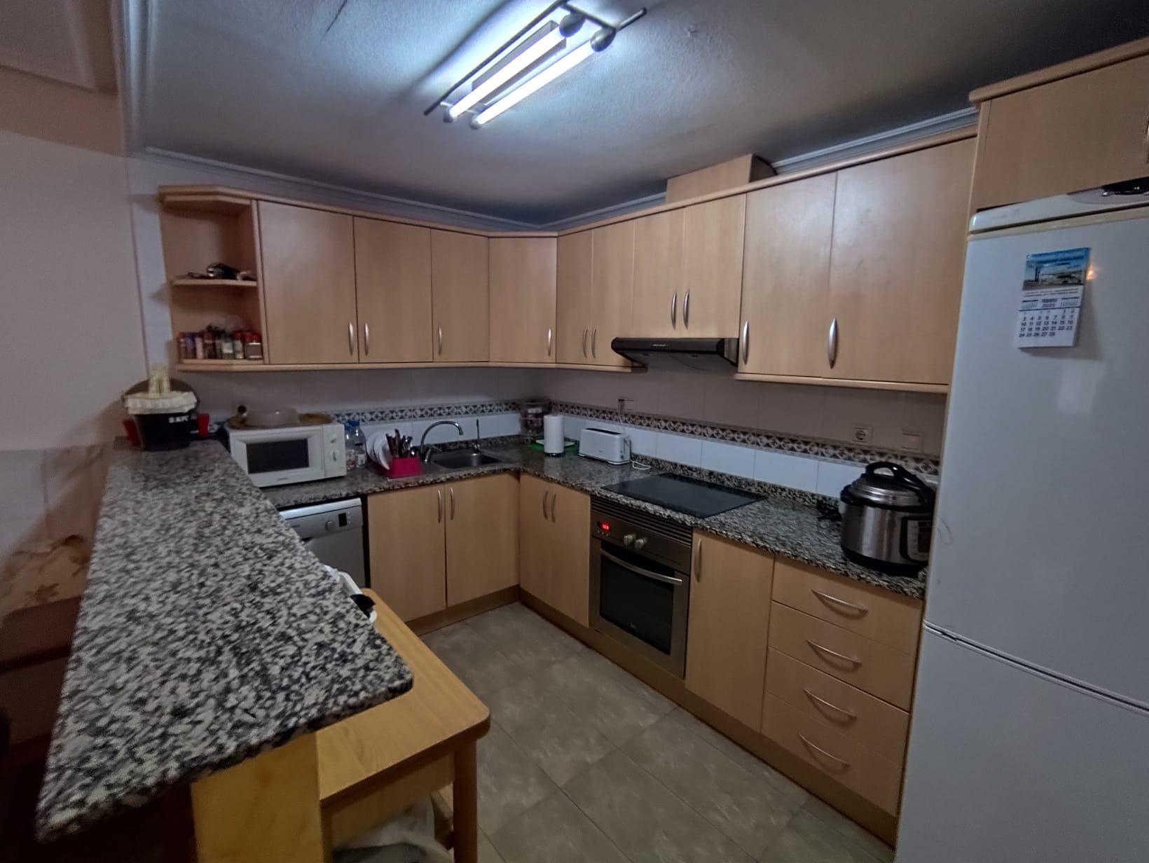 A ground floor apartment is offered for sale