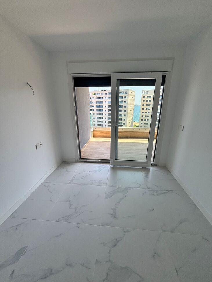 Master bedroom in apartment for sale in Punta Prima