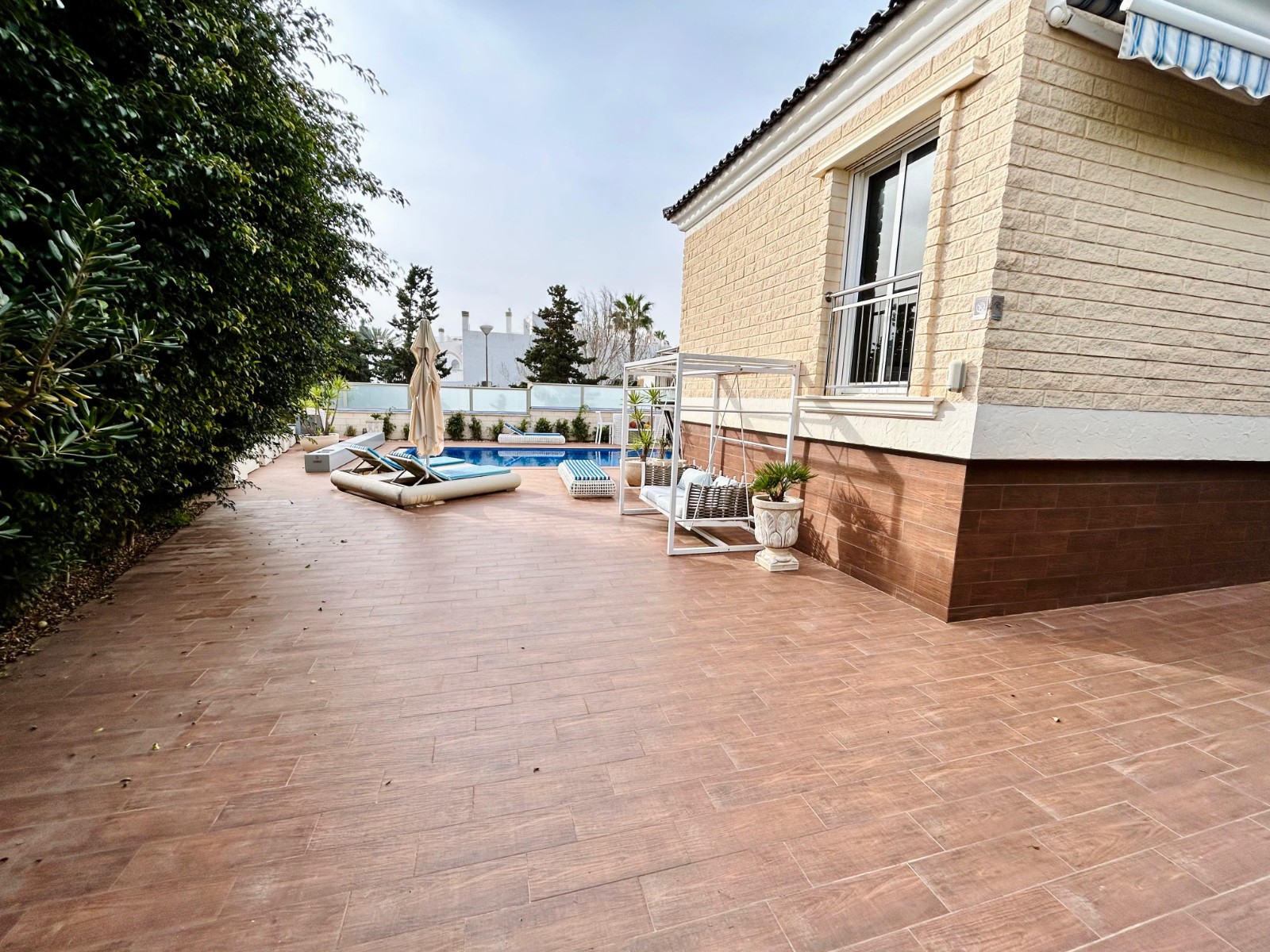 Pool area in villa for sale in Torrevieja