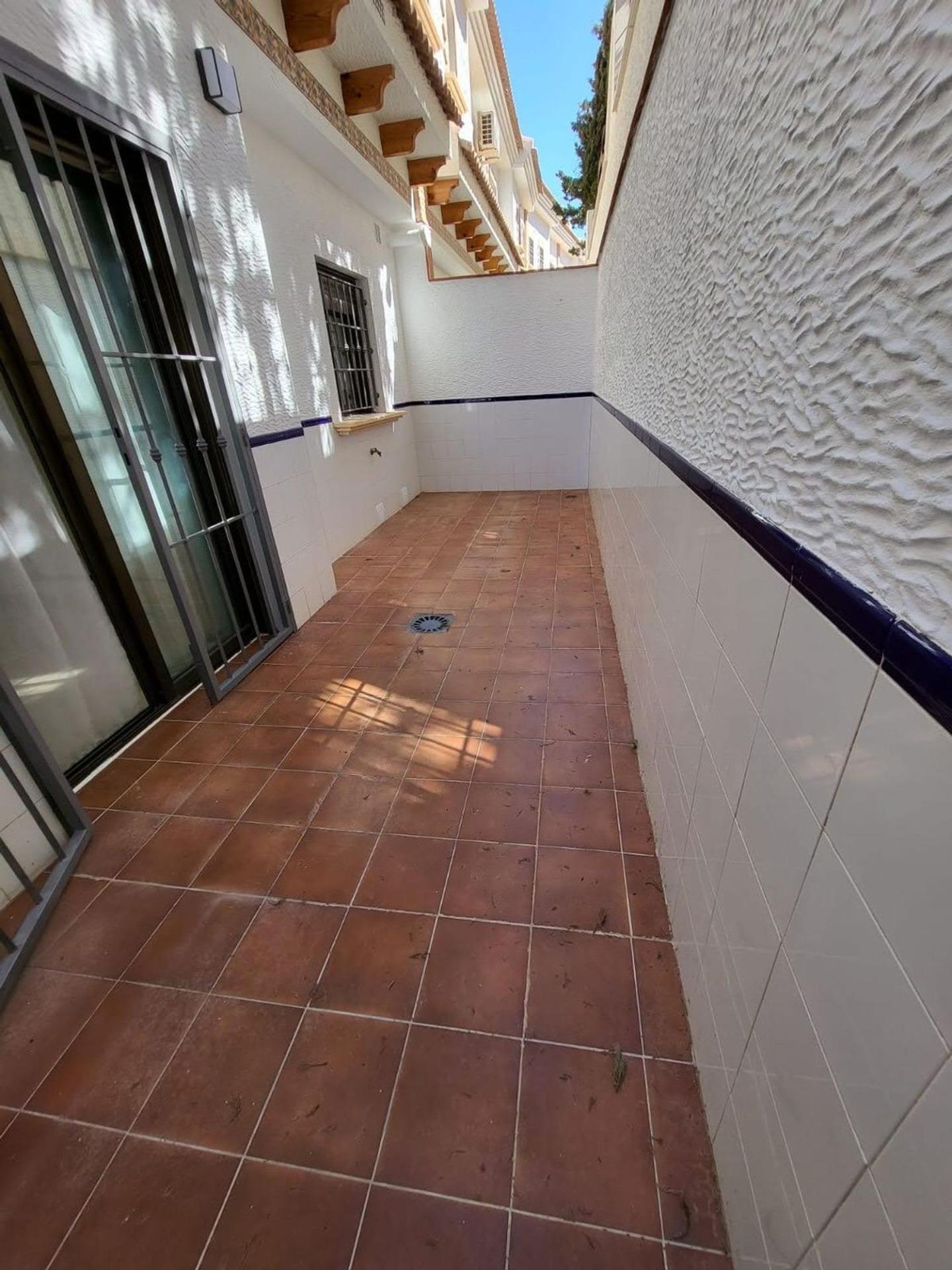 Pool area in terraced for sale in San Miguel de Salinas