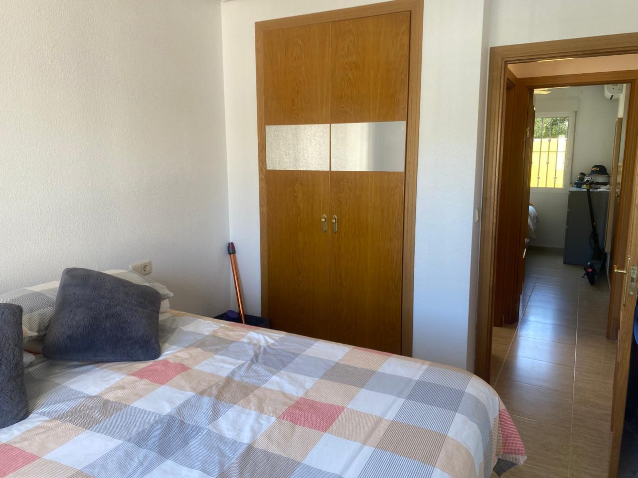 Master bedroom in apartment for sale in Algorfa