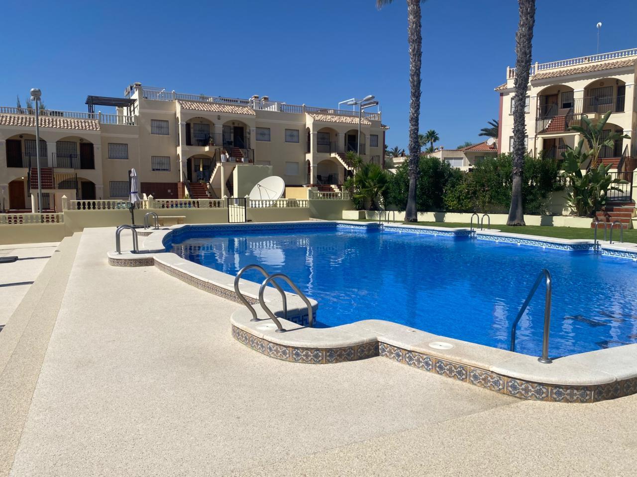 Pool area in apartment for sale in Algorfa