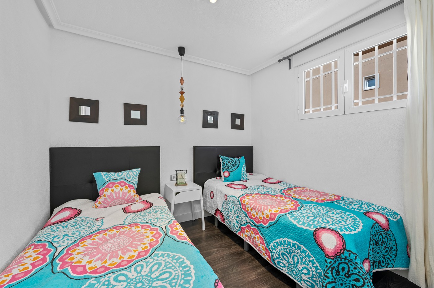 Living room in apartment for sale in Punta Prima