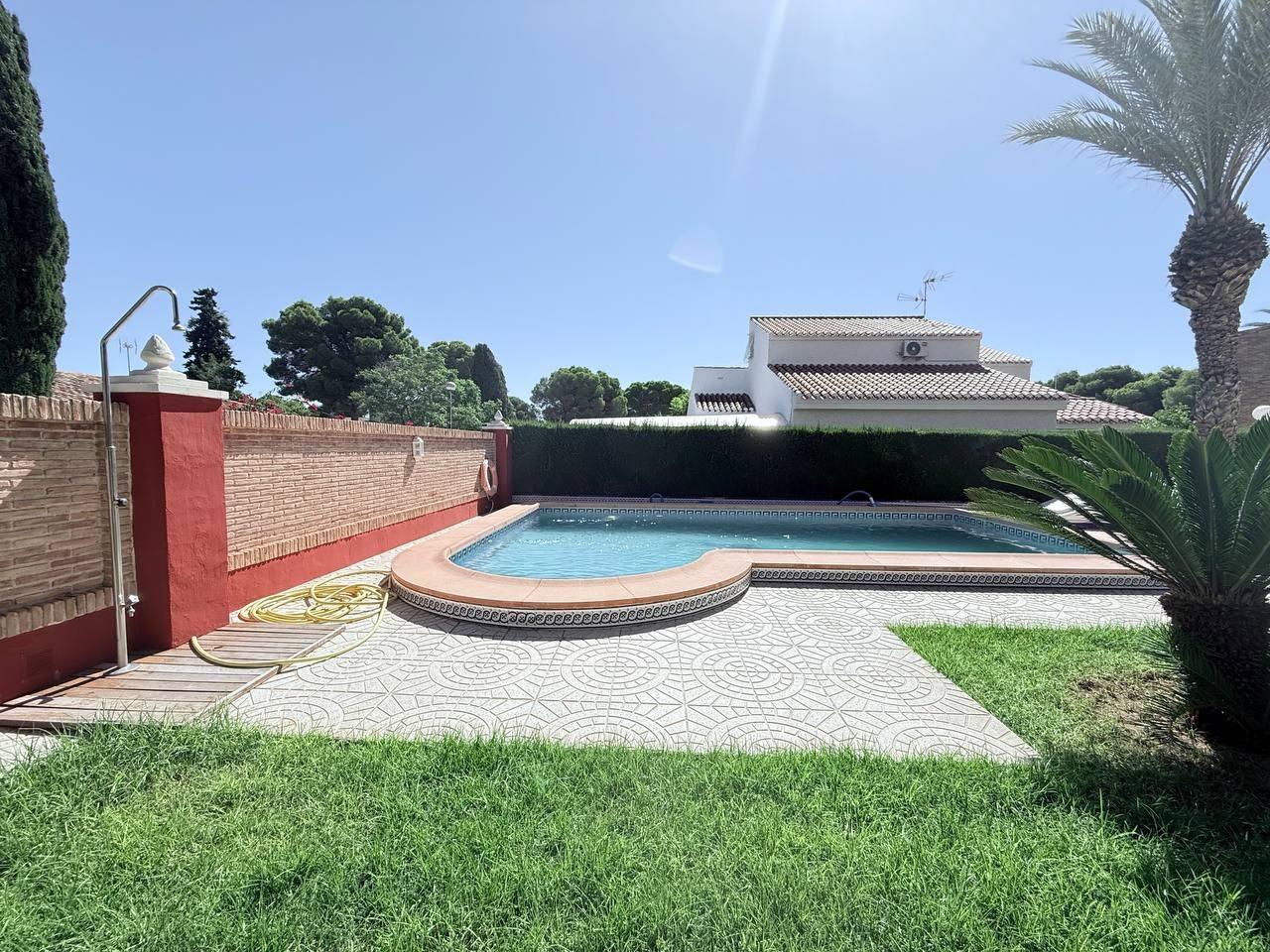 Pool area in villa for sale in Campoamor