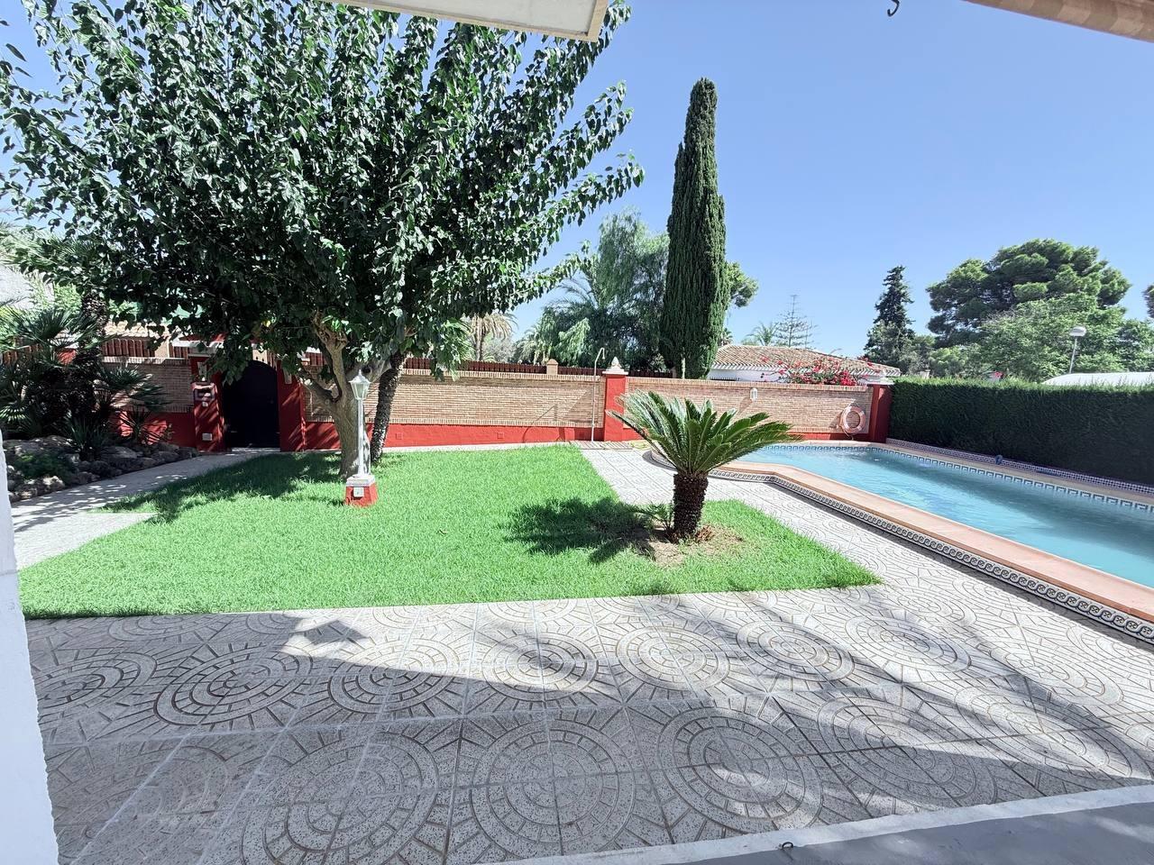 Pool area in villa for sale in Campoamor