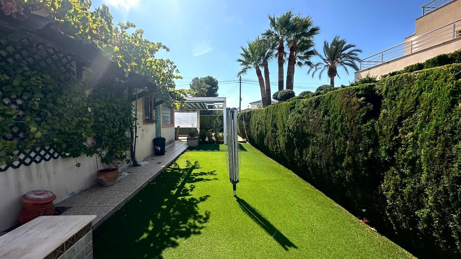 Living room in villa for sale in Cabo Roig