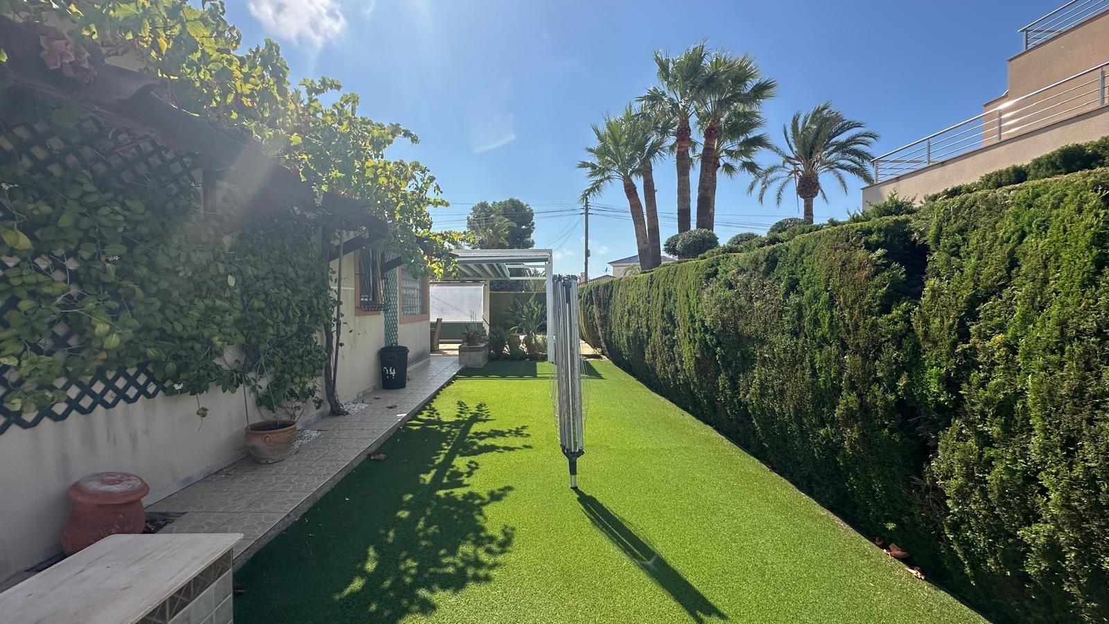 Pool area in villa for sale in Cabo Roig